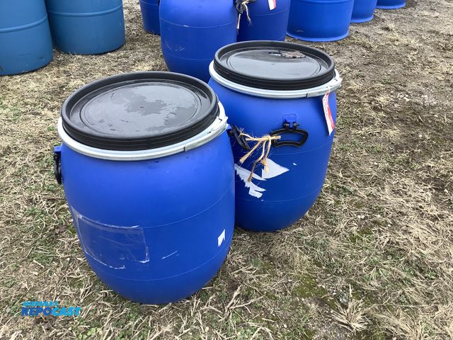 Lot 2-74443 - (2) 25 gallon blue plastic barrels with removable lids and locking rings. Clean Inside.