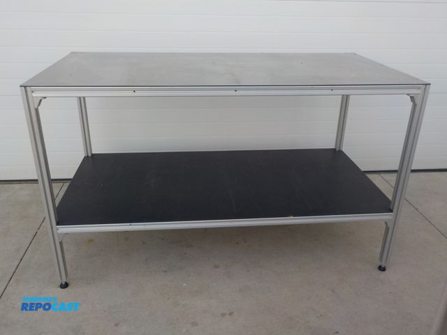 Lot 2-34127 - Commercial stainless steel top work station. Aluminum frame. Bottom shelf. Adjustable feet. 64" w x ...