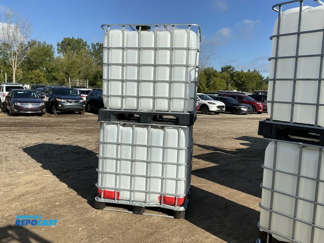 Lot 2-79847 - Stack of IBC totes - totes are approx. 37” tall x 43” x 3’