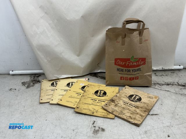 Lot 2-99517 - 30+ tractor and implement manuals