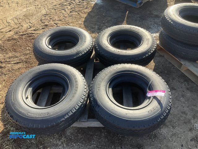 Lot 2-23677 - (4) 8-14.5 tires on steel mobile home style wheels, used