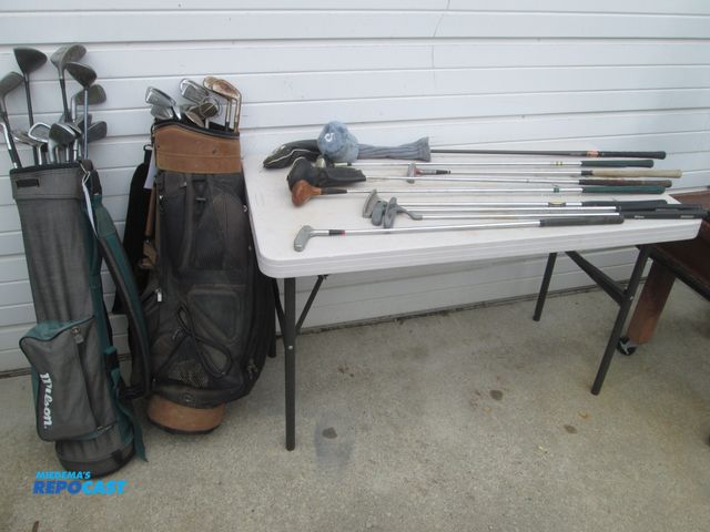 Lot 2-56975 - (2) Golf Club Bags w/ (36) clubs - (5) are putting balls, etc - Callaway/Wilson...