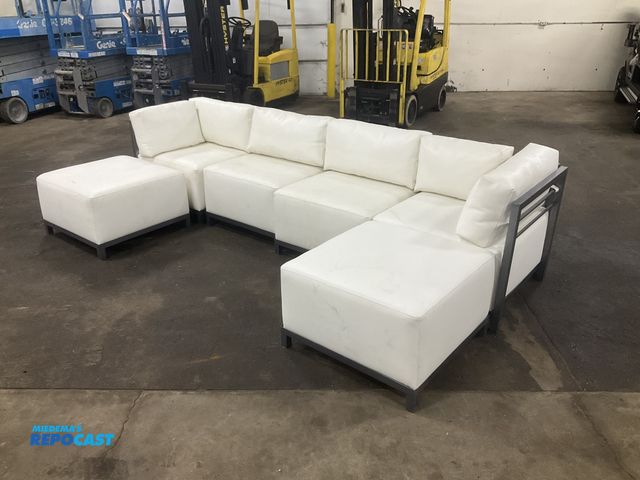 Lot 2-33220 - 6-piece white vinyl sectional with metal frames