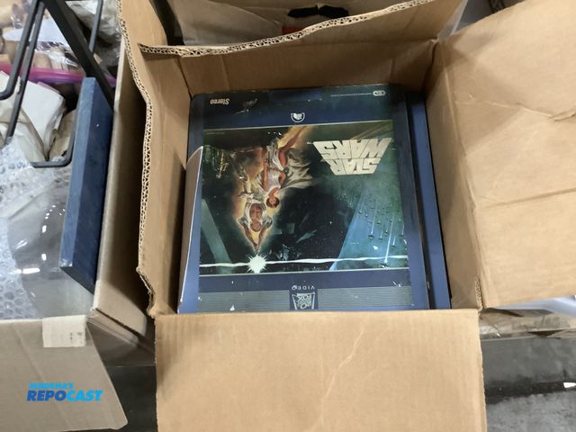 Lot 2-99190 - Laser disc player with laser discs
