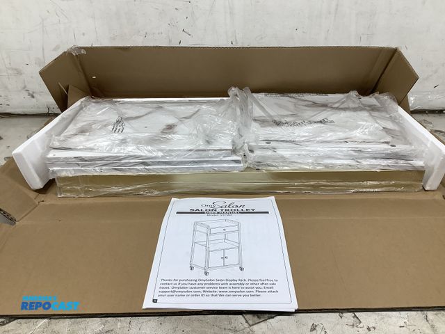 Lot 2-24683 - Omy Salon salon trolley in white marble.