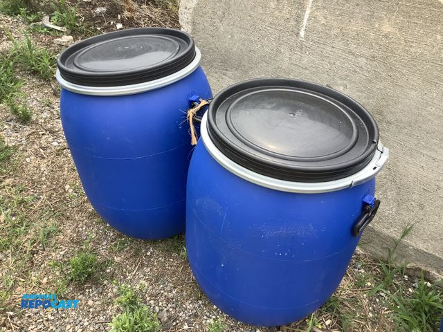 Lot 2-18419 - Lot of (2) 25 gallon blue plastic barrel with removable lid and locking rings. Clean inside. Contain...