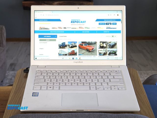 Lot 2-93594 - ASUS Imaginebook laptop, just reset to factory settings,