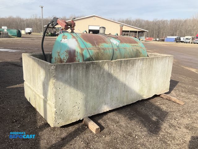 Lot 2-42907 - 300 gallon fuel tank with 12 volt electric pump, hose, dispenser nozzle and concrete spill containme...