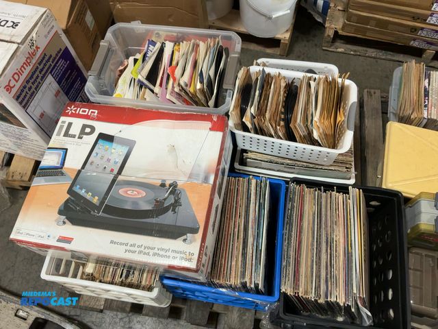 Lot 2-18189 - Skid lot of various records and a ion iLP turntable conversation system for iPad, iPhone, and iPod