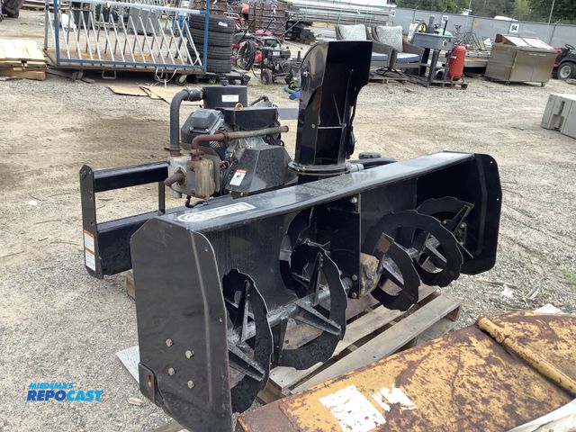 Lot 2-36737 - Kohler engine and BERC MAC tractor snow blower attachment model 700968X25K