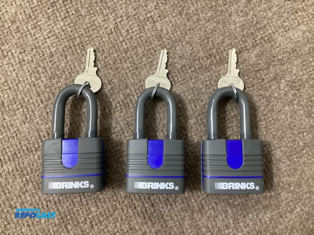 Lot 2-63254 - Three new Keyed Alike Brinks padlocks. BRINKS 40MM weather resistant padlocks. Rubber coated lock an...