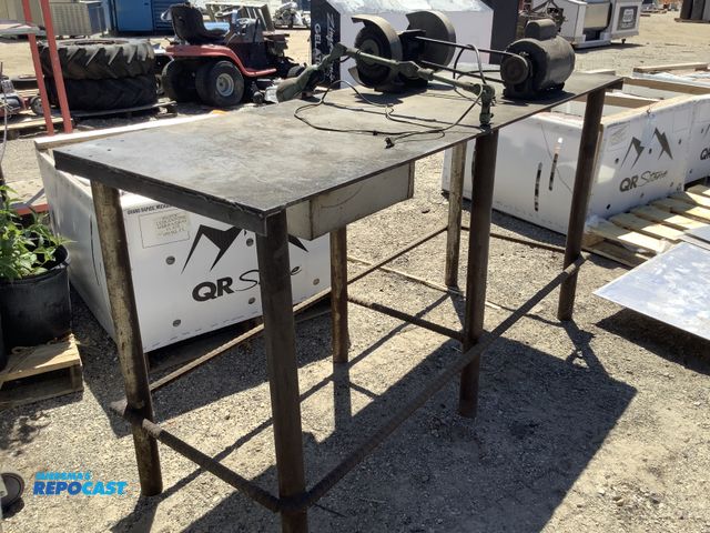 Lot 2-62368 - Heavy duty steel welding workbench/table with grinder, spare grinding wheels, light.
