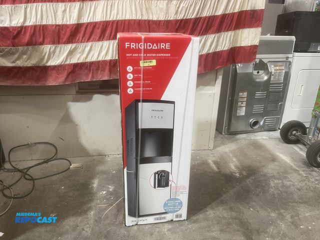 Lot 2-59387 - New Scratch & Dent Frigidaire bottom loading water dispenser new in bow
hot and cold water
holds 5 g...