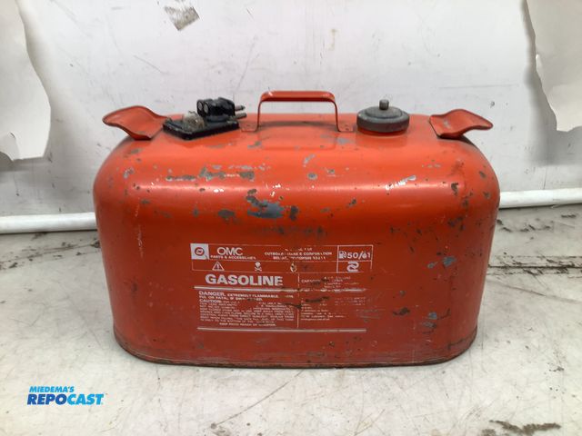 Lot 2-75433 - OMC Portable out board boat motor. metal gasoline tank. Complete six and one half gallons gas tank w...