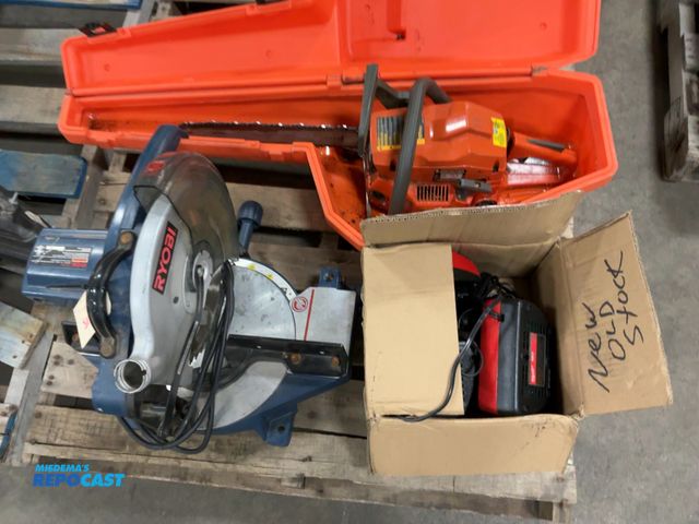 Lot 2-67369 - Ryobi double insulated 10 in miter saw husqvarna chain saw and 4 Milwaukee chargers