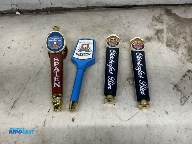 Lot 2-93923 - Lot of (4) tap handles 2- paulaner munchen Oktoberfest bier 1- Oktoberfest spaten Munich 1- ur-marte...