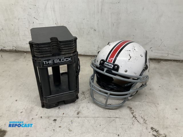 Lot 2-33036 - Power Block Personal The Block adjustable dumbbell, and a red, white, and black schutt recruit hybri...