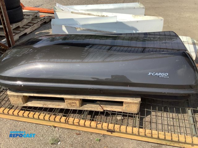 Lot 2-64497 - car-top carrier - includes all hardware to go with it as well