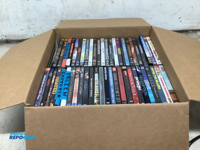 Lot 2-19537 - Approximately 50 dvds including red,how to train your dragons 2, coup,es retreat, wedding crashers, ...