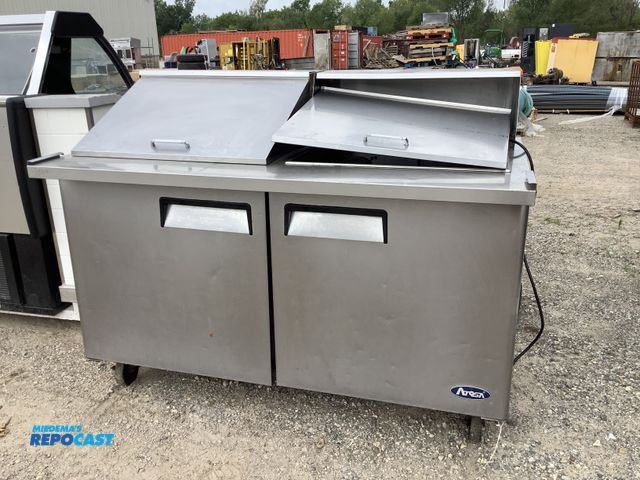 Lot 2-91010 - Large two sided stainless steel  food prep table approximately. 60” x 34” x 47”