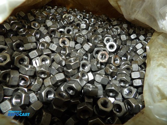 Lot 2-53310 - Lot of (3600) new nuts 5/6-18" Zinc plated, grade 5