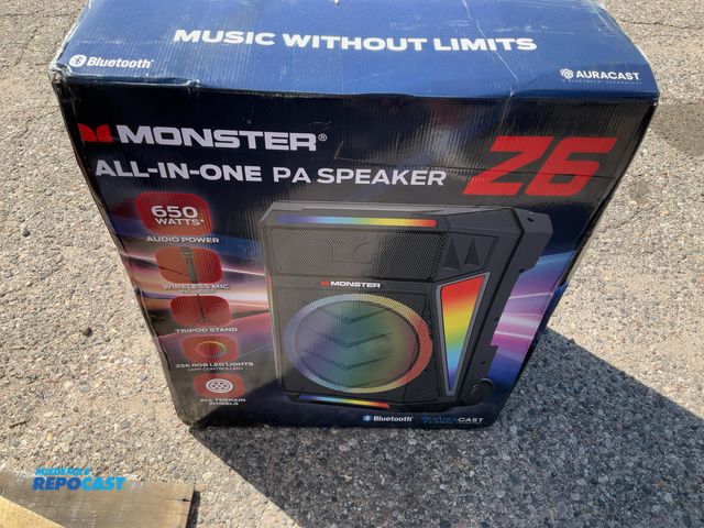 Lot 2-75998 - Monster all in one PA speaker 26, 650 W wireless mic tripod stand 256 RGB LED lights all terrain whe...