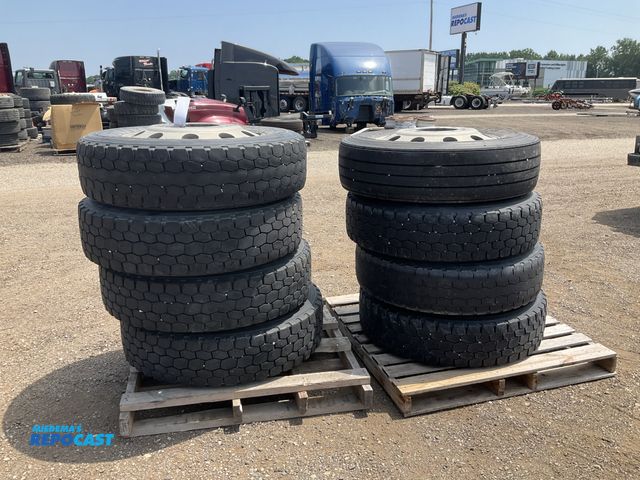 Lot 2-11159 - (8) 285/75R24.5 semi tires on aluminum wheels, seven have matching tread pattern and one is differen...