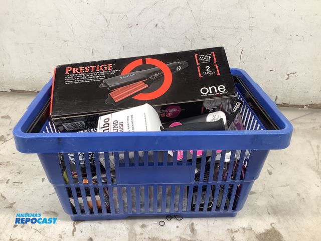Lot 2-34556 - Lot of assorted beauty products including waver, brushes, nail files, hair ties, makeup brushes, and...