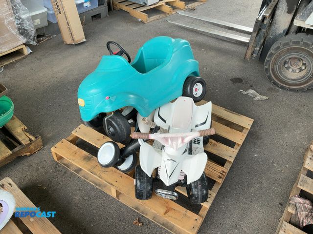 Lot 2-91330 - Skid of a Little Tikes Cyan Car, Honda Mini ATV, and Miscellaneous Sit-On Scooter