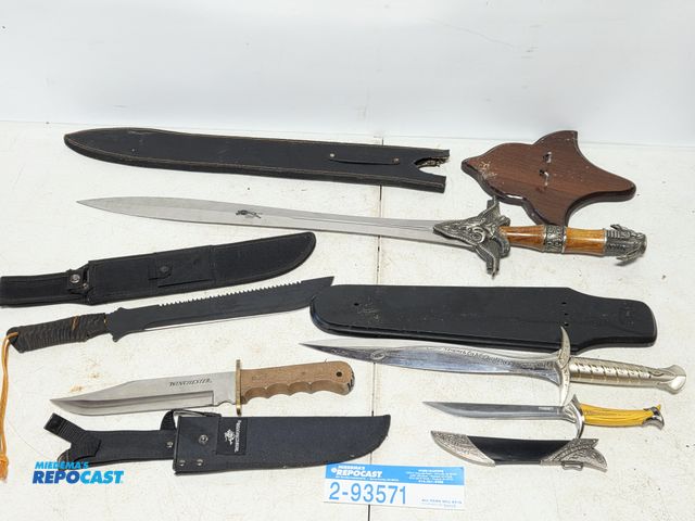 Lot 2-93571 - lot of fantasy and movie theme swords and knives.