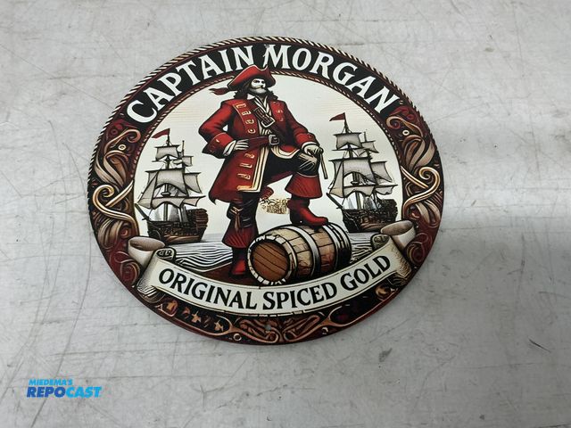 Lot 2-67039 - New Metal Sign Captain Morgan original spiced gold metal sign 7.75 inch in diameter