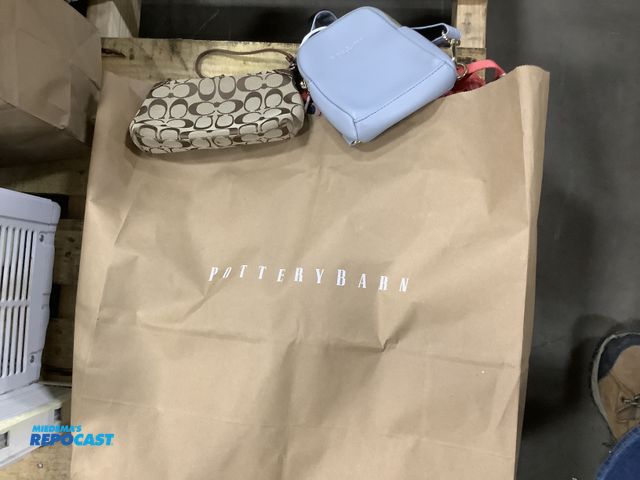 Lot 2-67001 - Pottery barn paper bag filled with a mixed set of hand bags/purses some long straps, short straps, b...