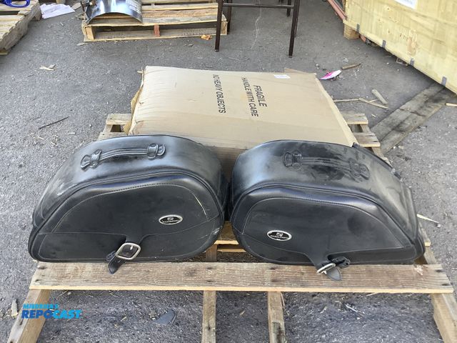 Lot 2-34868 - (2) Saddlemen Side Saddle Bags, and (2) Motorcycle Windshields