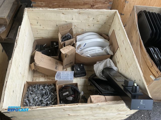 Lot 2-24561 - crate of dometic toilet seats, awning fabric, molded structural plastic mounting brackets,  brake va...