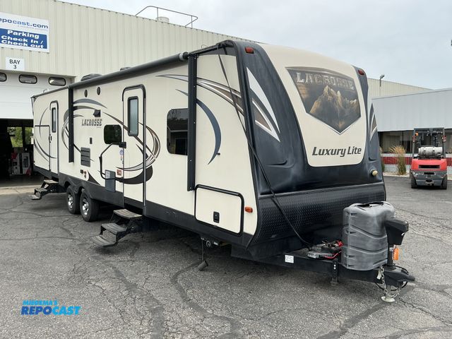 Lot 2-18796 - 2016 Forest River Lacrosse M-318 BHS Luxury Lite Camper Travel Trailer