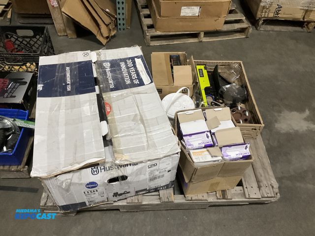Lot 2-67883 - Skid lot includes latex gloves, a Husqvarna auto mower, and more