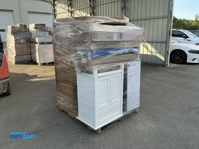 Lot 2-75648 - Skid of assorted bathroom furniture, including: a linen cabinet, shower columns, vanities/cabinets, ...