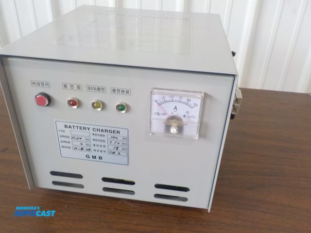 Lot 2-34244 - GMB battery charger. 12 volts. 115 volt power cord.