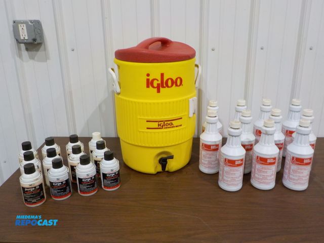 Lot 2-61943 - Igloo Commercial Cooler, (11) Sani-bright disinfectant cleaner, (12) insect killer (last 30 days)