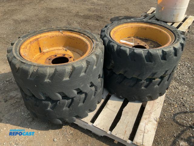 Lot 2-40591 - (4) Used Solideal Size 33x12-20 Solid Rubber Skid Steer Tires and Wheels, 8 on 8" bolt pattern