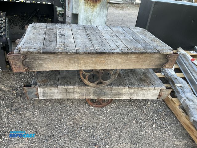 Lot 2-96802 - (2) Industrial Rail Carts - Antiques. Each measure approximately 12-15”Hx50”Wx25-28”D