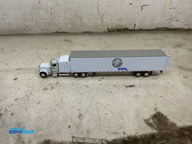 Lot 2-92057 - Die cast FPL truck and trailer model