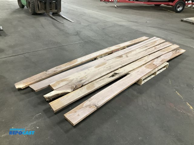 Lot 2-21206 - (6) 5/4 Walnut wood boards approx 12’ lengths, widths from 5” to 7”