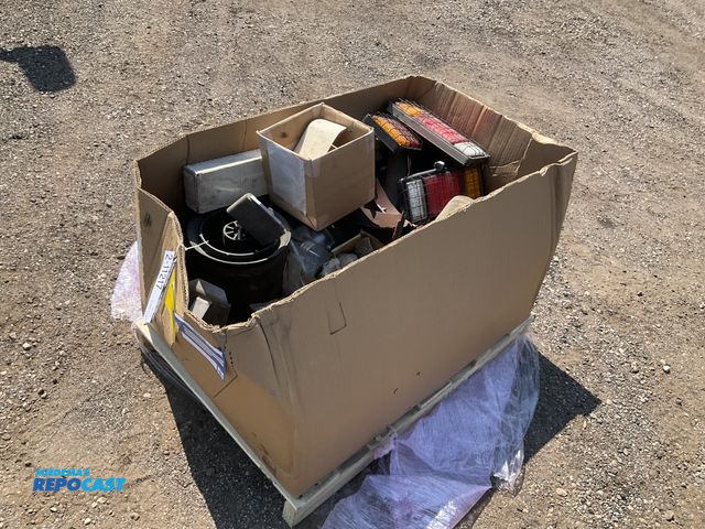 Lot 2-11217 - Box of misc truck parts including lights, air suspension air bag, brake shoes, air brake parts, hydr...
