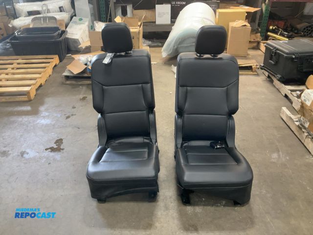Lot 2-16356 - 2 black leather bucket seats from a 2025 or 2024 ford