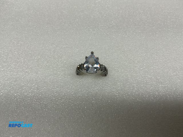 Lot 2-18110 - Silver synthetic cubic zirconia color stone, size 7 1/2