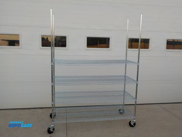 Lot 2-34128 - Commercial storage rack. Four adjustable shelves. Locking castors. NSF approved. 60" w x 24"d x 80" ...