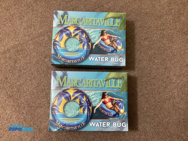 Lot 2-69901 - Two new Margaritaville Water Bug tubes. Approximately 48 inches in diameter.