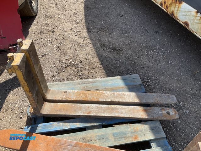Lot 2-44722 - (2) forklift forks for a 16” carriage, one is approx 42-1/2” long and the other is approx 41-1/2”L, ...