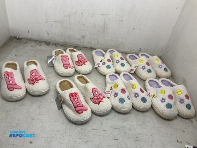 Lot 2-32627 - Lot of 7 pairs of women’s slippers including pink cowboy hat and boots, and flower and smiley faces